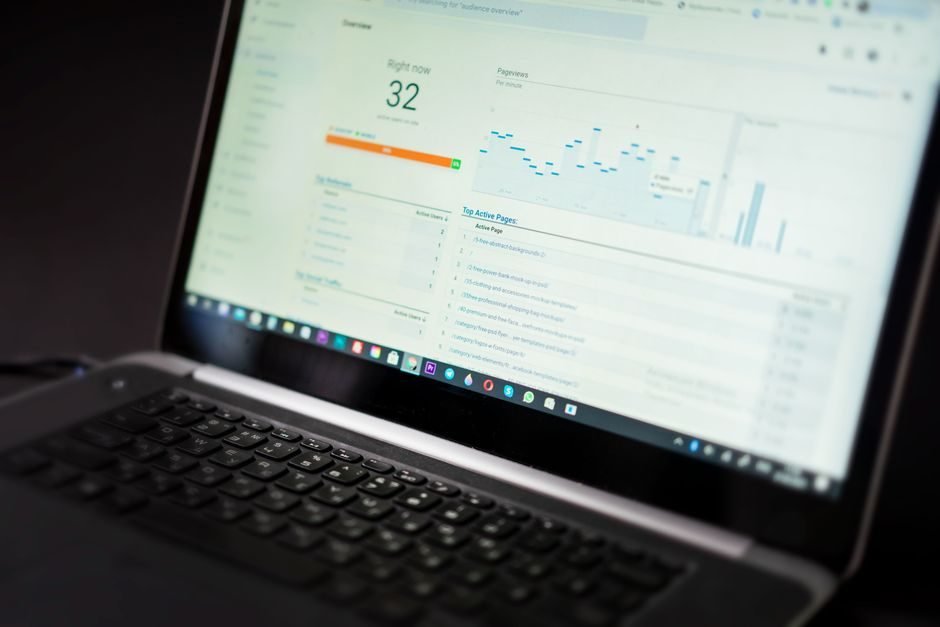 Performance monitoring dashboard on a computer monitor, like the AWR wait-event view that exposed Oracle parallel statement queuing