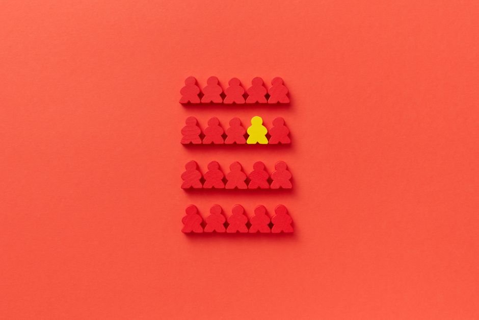 One yellow piece standing out among red pieces - nearest-neighbour similarity, the core idea of vector search